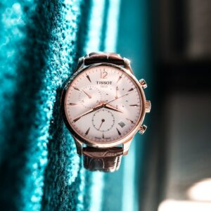 round silver-colored Tissot chronograph watch